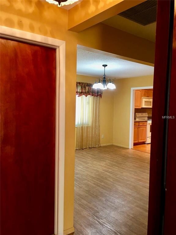 Entrance and door to garage