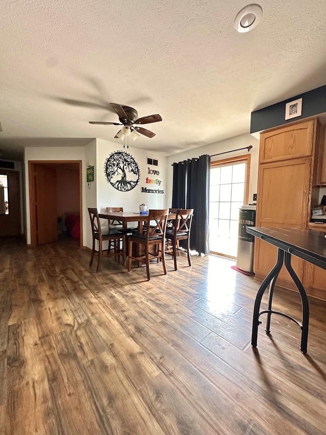 Dining area patio doors lead to back deck