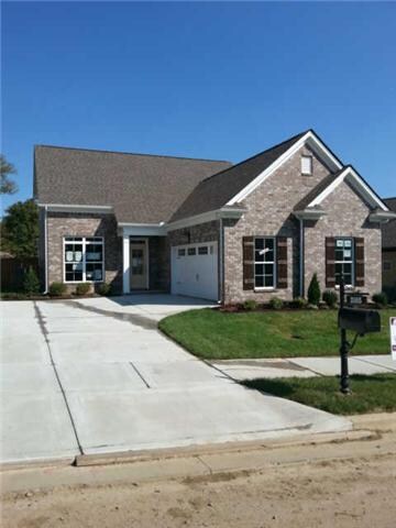2 Car garage with courtyard entry.