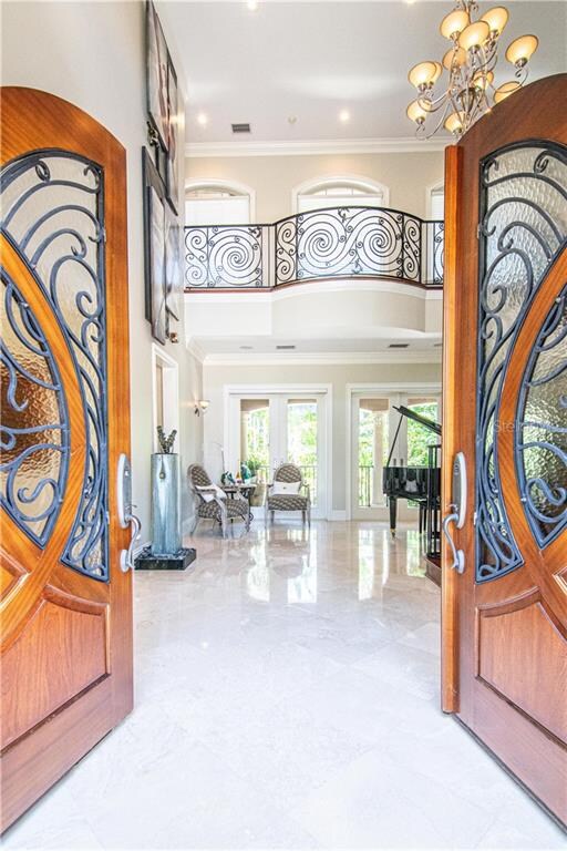 Custom wood doors greet you walk in.  The detail o