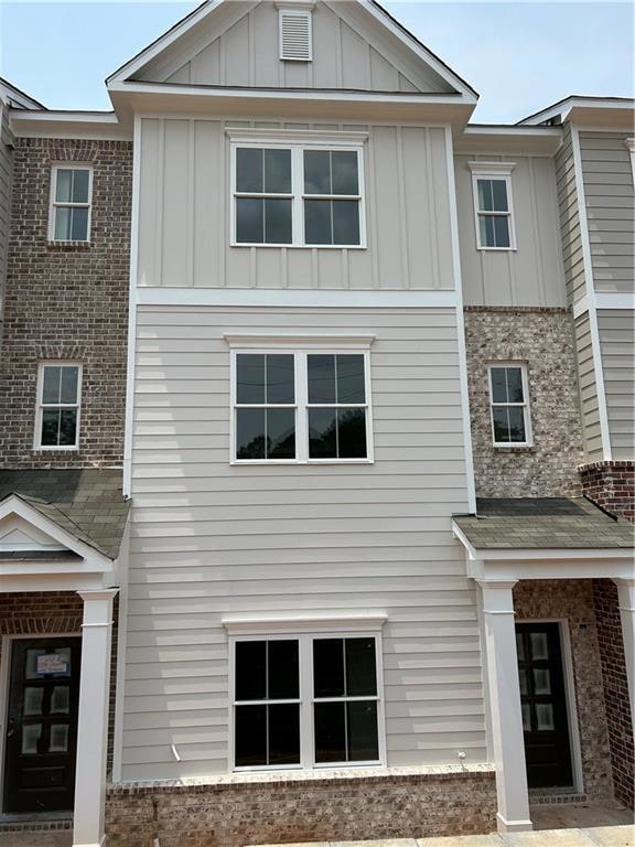 Lot 3 with board and batten, brick and siding. Each home has it's unique exterior.