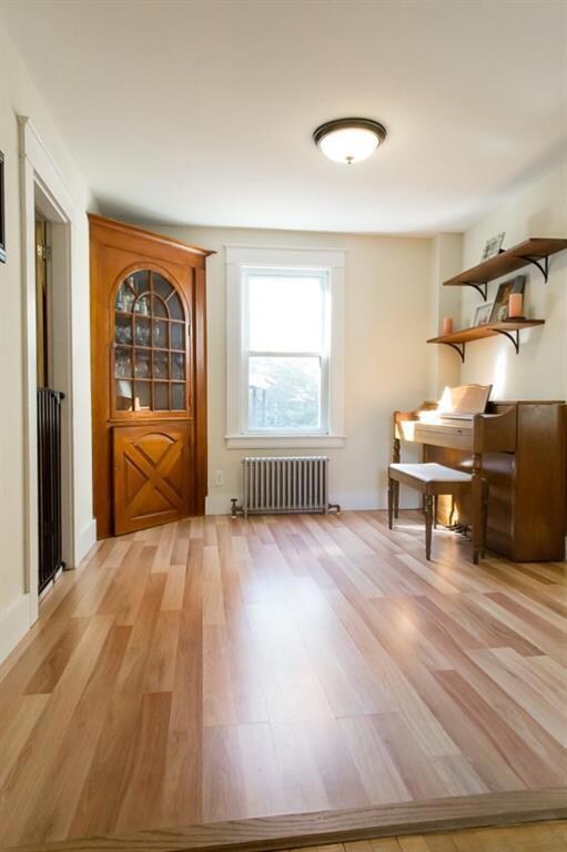 A formal dining room is located...