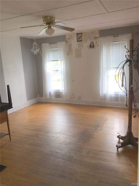 Spacious Family Room With Hardwood Floors.