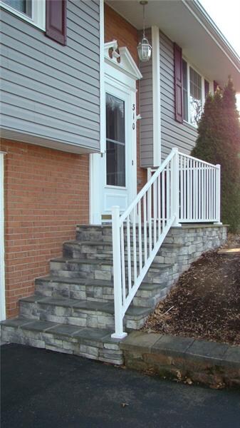 New Stone steps and vinyl rails