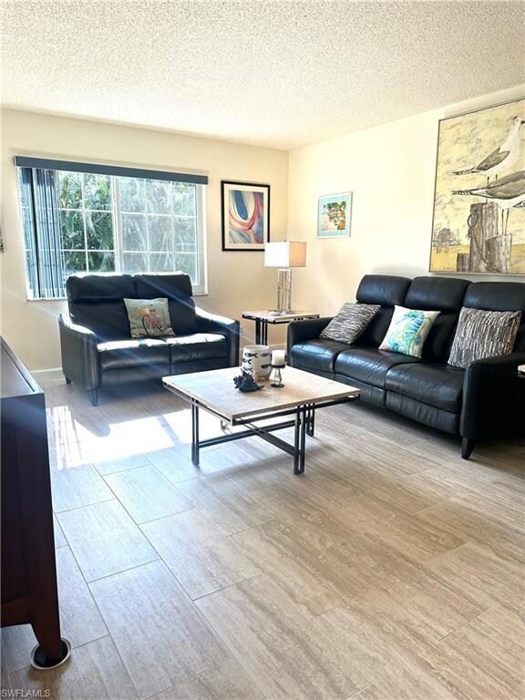 Living room with a textured ceiling