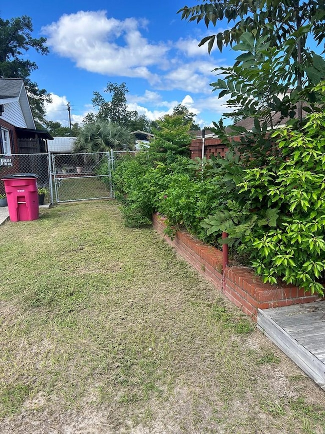 SIDE YARD ON RIGHT