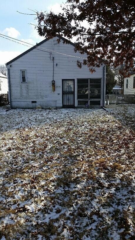 Rear view of home & deep lot