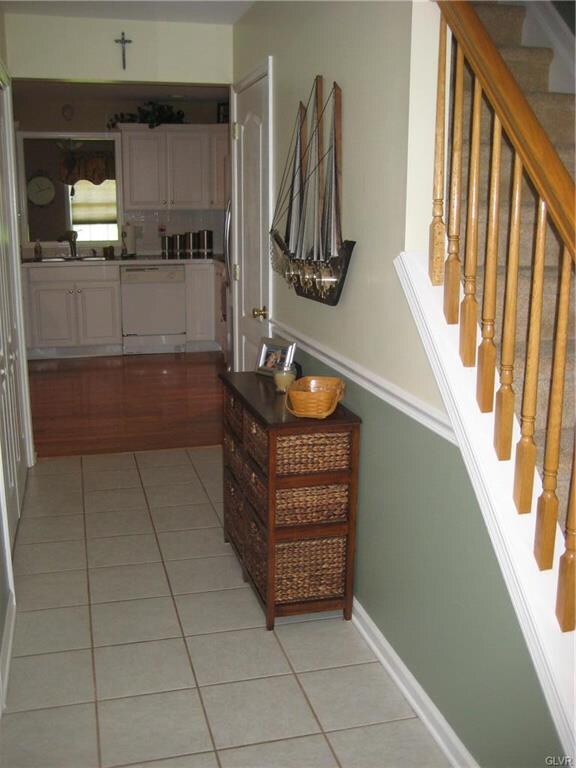 The functional tiled foyer leads to main living ar