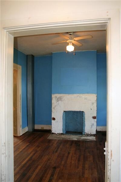 Living room fireplace is ready and waiting for ins