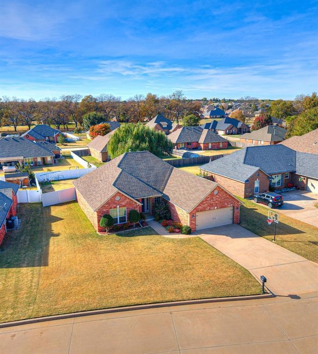 Another view of front of house showing the expansive yard. Class 4 shingles on roof.