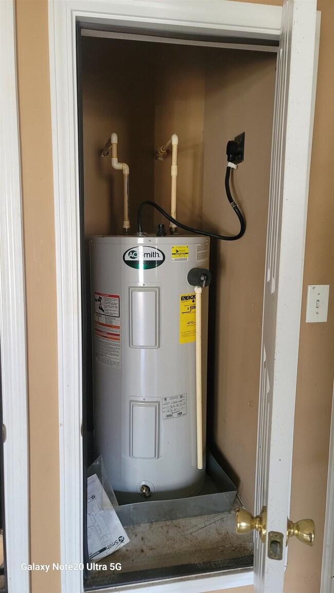 Utility room with water heater