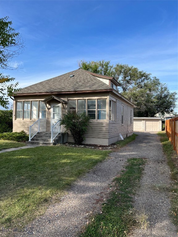 Left side with driveway