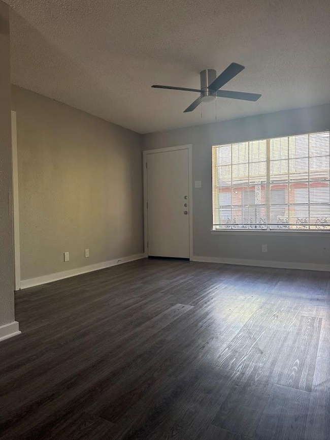 Spare room featuring a textured ceiling, ceiling 