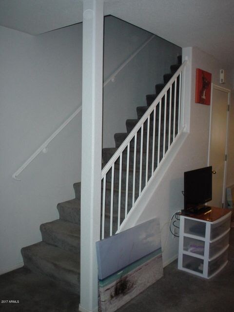 Stairway to both Master Bedrooms