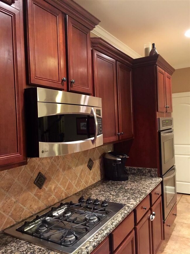 Beautiful Kitchen features a gas stovetop, built i
