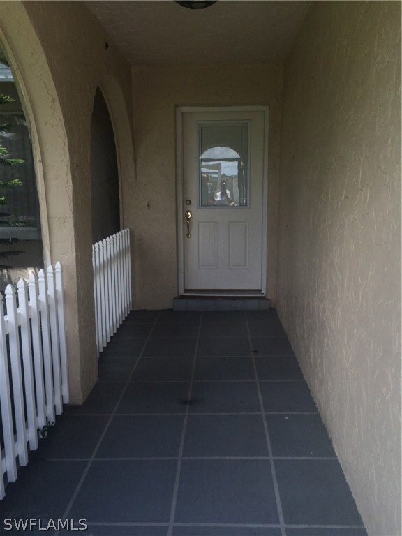 Large screened front entry welcomes you home!