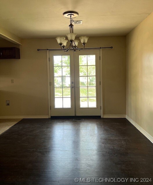 Dining Room w/French doors opening to back yard