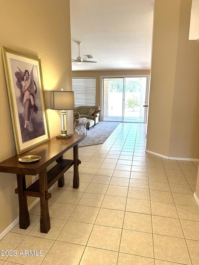 HALL TO FAMILY ROOM AND BACK YARD