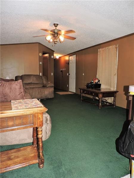Living Room: wall to wall carpet, ceiling fan, 17x