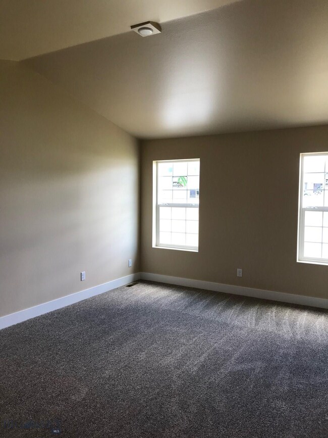 Master bedroom. Photo of similar home.