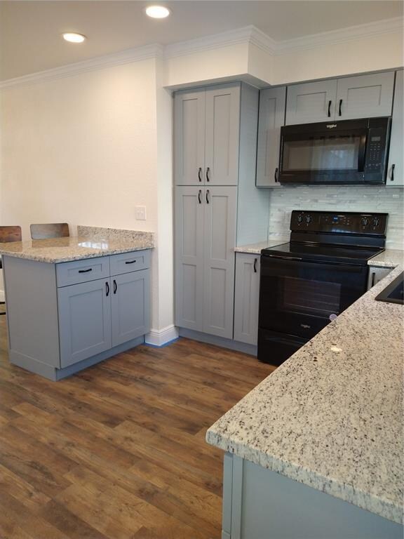 Grey soft close shaker style cabinets.