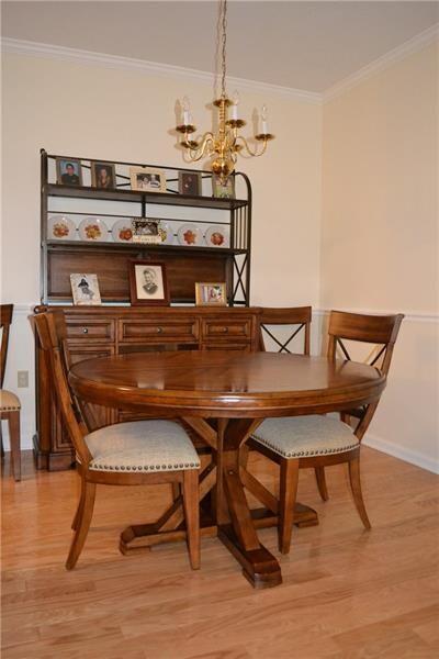 The dining room with beautiful hardwood floor.
