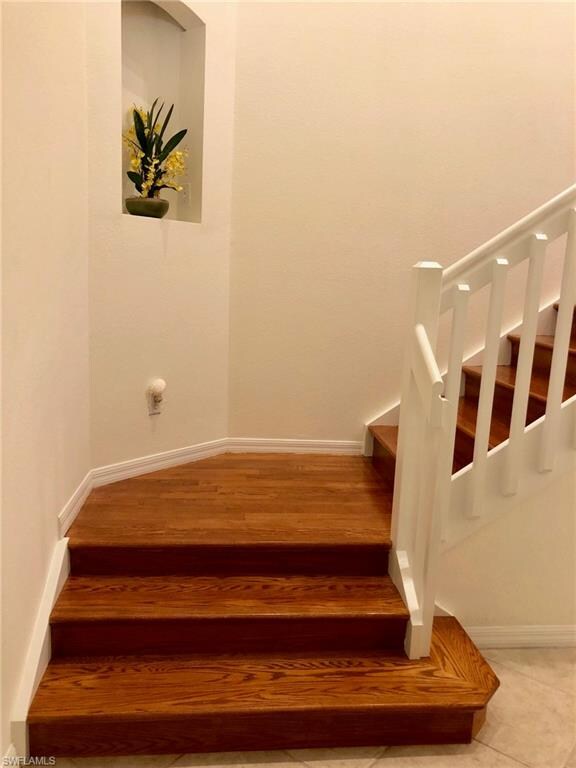 Beautiful wood floor stairway.