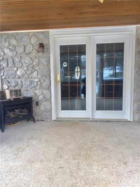ENTRANCE TO DINING ROOM FROM ENCLOSED PATIO/SUNROO