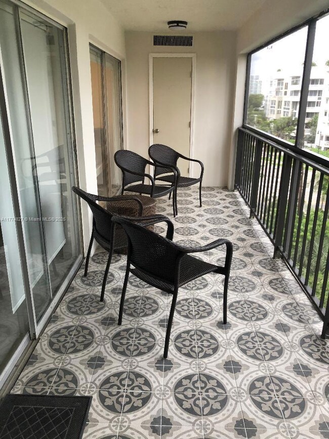 The balcony is spacious and the bedrooms have access to the balcony. Look at the tiles, they are modern Spanish style.