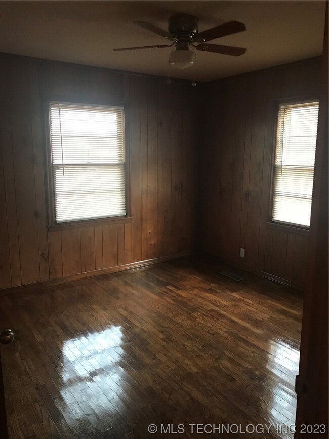 Rear bedroom with beautiful hardwoods and good siz