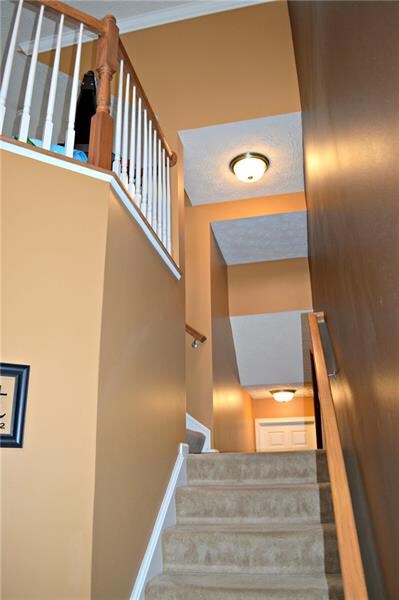 A beautiful 2-story foyer greets you as you enter.