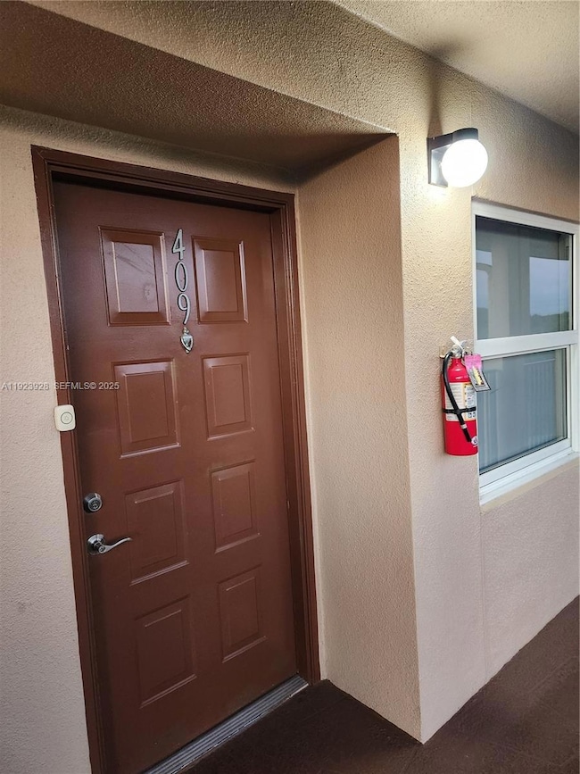 12955 SW 16th Ct unit 409M, Pembroke Pines, FL 33027 - photo 2