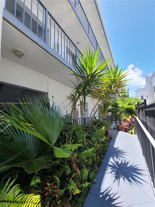 Walkway to the outdoor lobby from the street gate