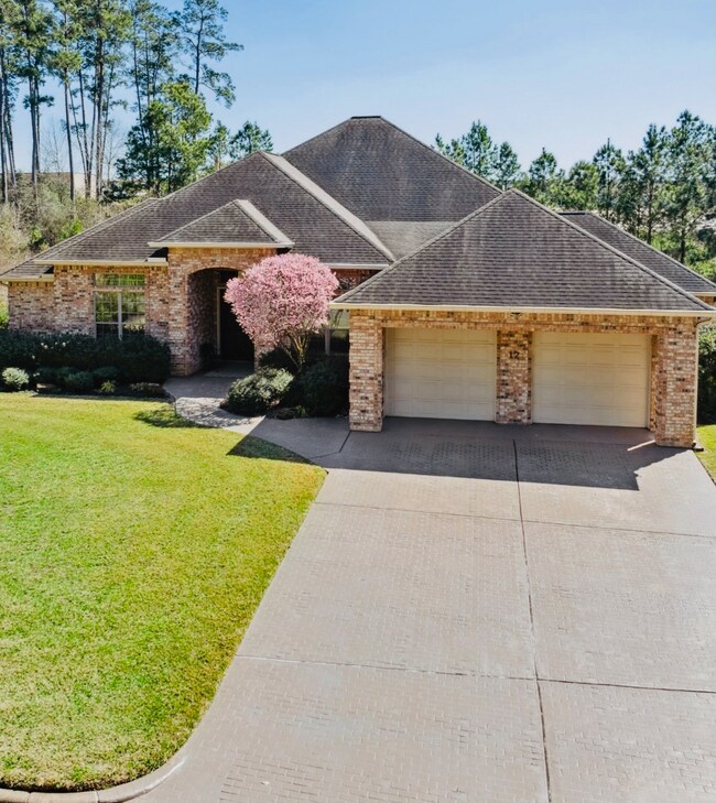 From the groomed landscaping and x-tra wide drivew