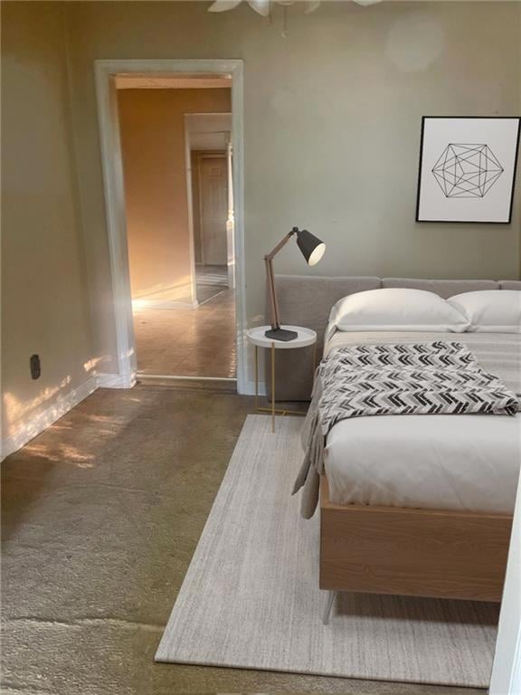 Bedroom featuring carpet and ceiling fan