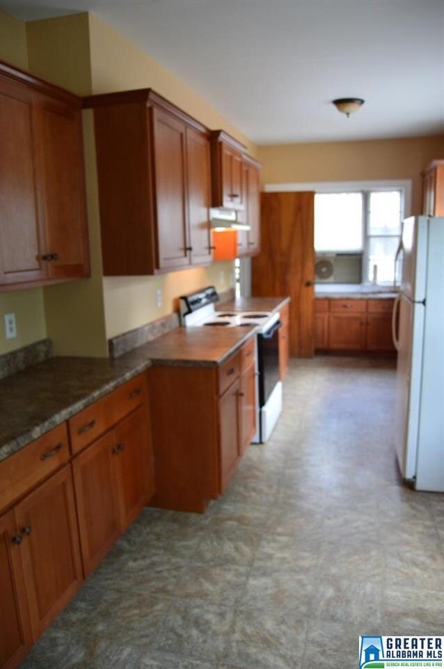 Galley style kitchen with plenty of space and stor