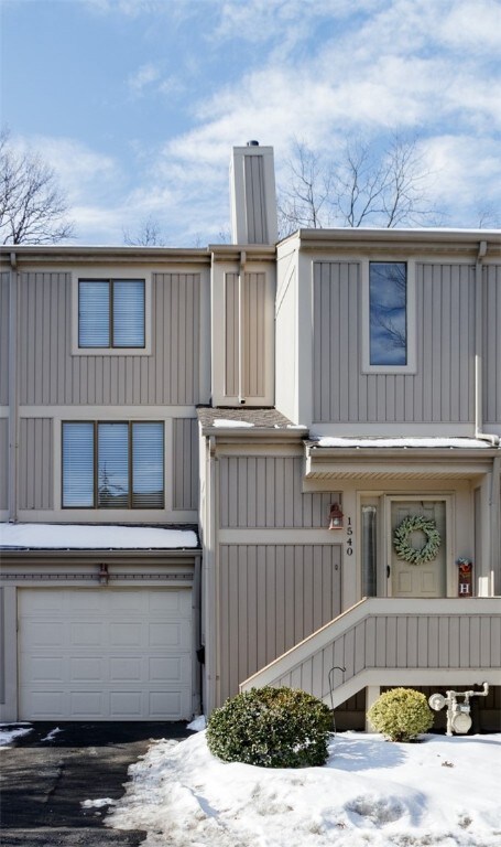 This adorable large townhouse has a newer garage d