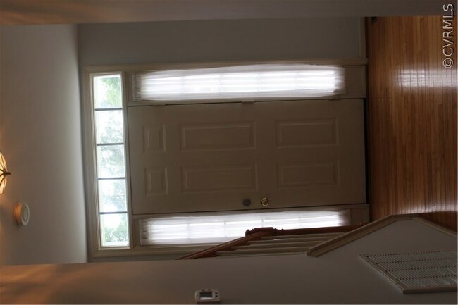 Foyer with hardwoods