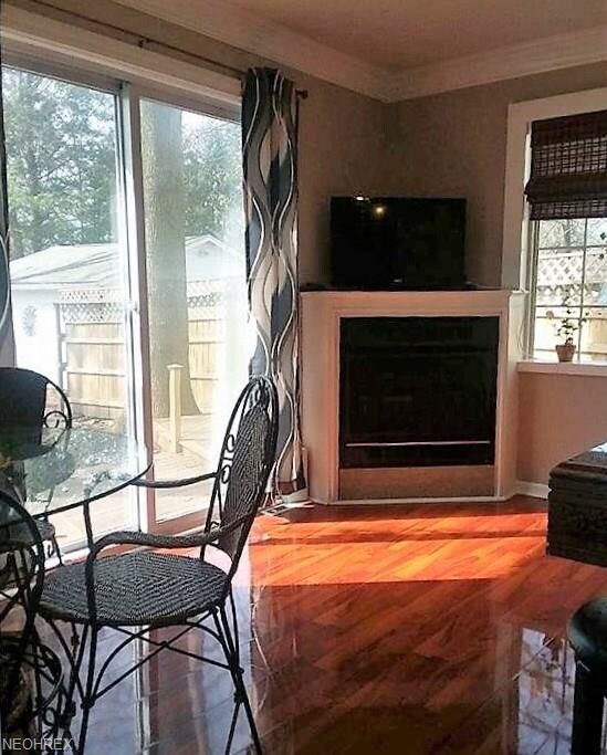 The beautiful flooring, deep set crown molding and