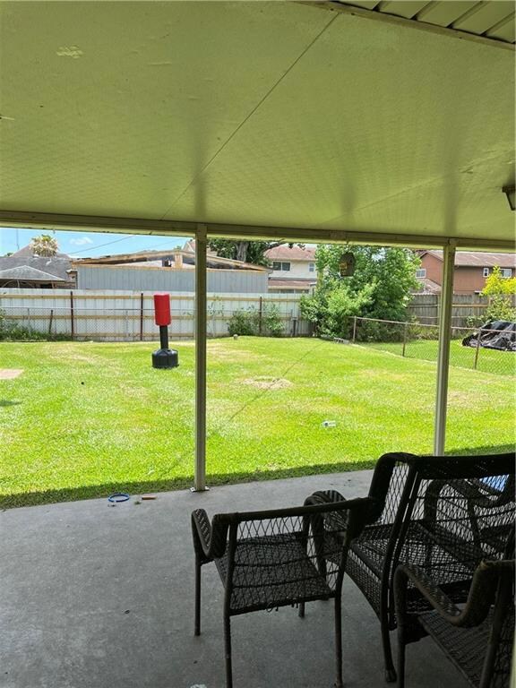 Covered patio, large rear yard, with backyard acce