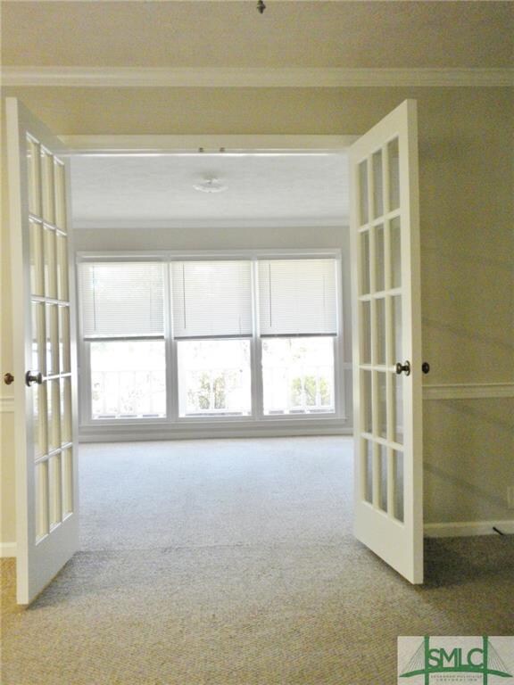 Two living areas, divided by french doors