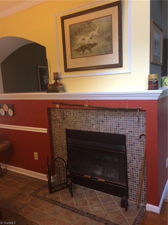 Tile Floor and Fireplace in Dining Room