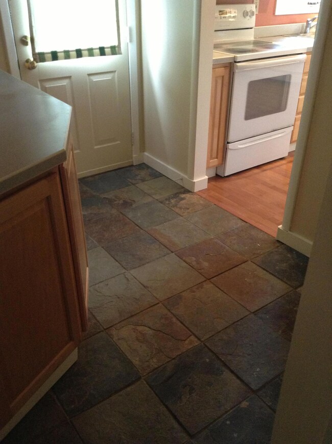 Mudroom off kitchen to deck w/slate flrs