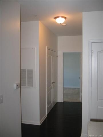 Hall with laundry facility on the left.
