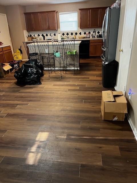 Kitchen featuring dark hardwood / wood-style floor