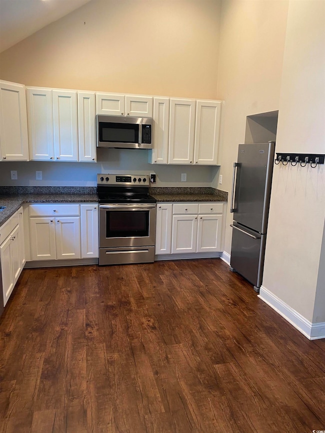 Kitchen with appliances with stainless steel finis