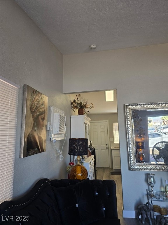 Living area featuring a wall mounted air condition