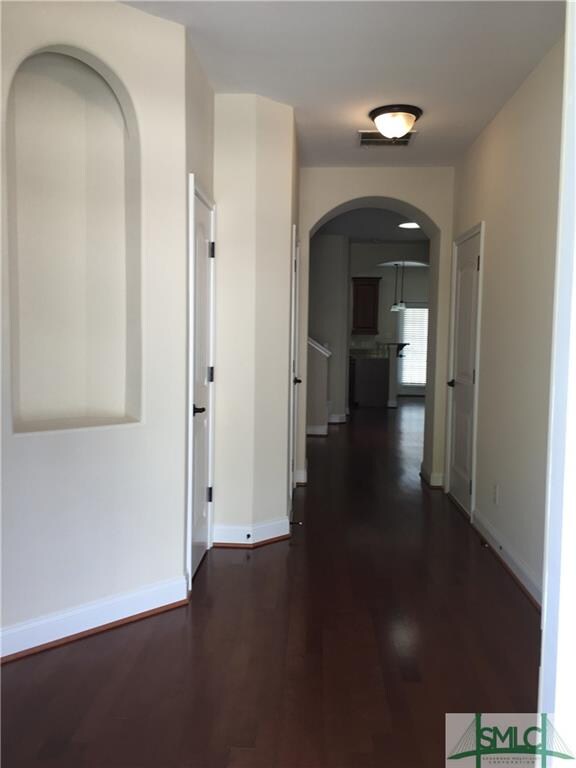 Arched doorways and decorative niches make this a 