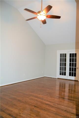 Large Family Room with New Ceiling Fan, Freshly Re