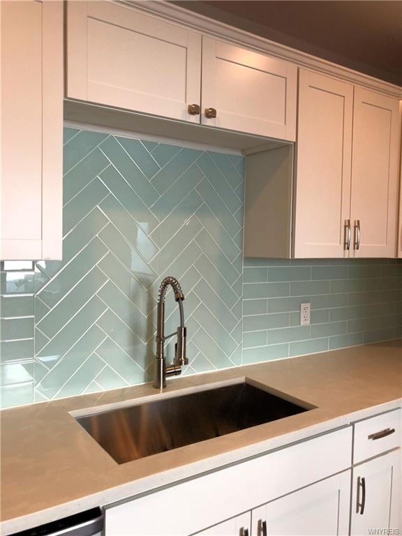 White Concrete Countertops with Glass Tile Backspl